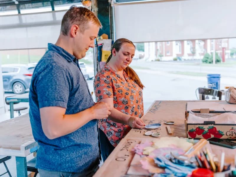 Couple at Crossroads Craftworks choosing craft project