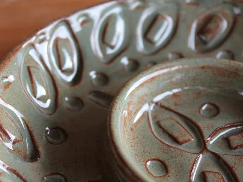 Handmade Pottery plate made by Ashlee Springer, upclose on detail.